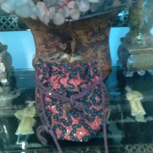 Beautiful beaded drawstring evening ware